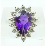 A 14ct white gold, diamond and pear shaped amethyst ring, diamond weight approximately 0.