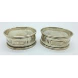 Two silver napkin rings,