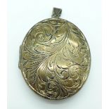 A large hallmarked silver locket,