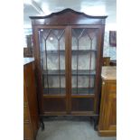 An Edward VII mahogany two door display cabinet