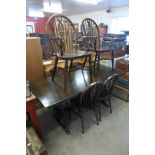 An oak refectory table and six chairs