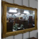 A Victorian carved gilt framed mirror