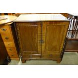 A George III mahogany two door cabinet