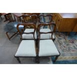 A set of four William IV kidney shaped back rosewood dining chairs