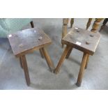 A pair of primitive elm stools