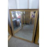 A gilt framed mirror