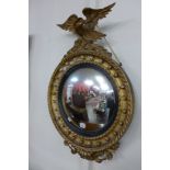 A Regency style gilt framed convex mirror