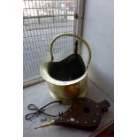 A brass coal scuttle, shovel,