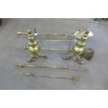 Brass andirons and companion set