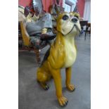 A large ceramic figure of a boxer dog