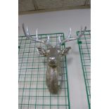 A silver stag's head