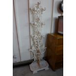 A Victorian painted cast iron hallstand,