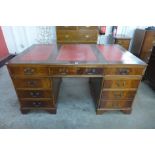 A mahogany pedestal desk