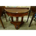 A Victorian mahogany demi-lune console table