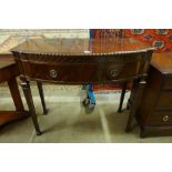 An Edward VII Adams style mahogany bow front side table,