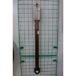 A Comiti of London mahogany stick barometer