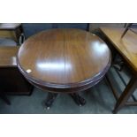 A Victorian mahogany oval tilt top breakfast table
