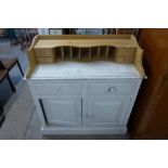 A painted pine sideboard and a pine pigeon hole/desk tidy