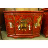 A chinoiserie red lacquered cabinet