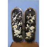 A pair of Chinese black chinoiserie panels