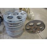 Eleven galvanised film reels