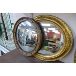 A gilt convex mirror and an oval gilt mirror