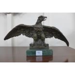 A bronze figure of an eagle,