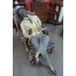 A life size painted figure of a 1950's style American gentleman