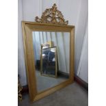 A large gilt framed mirror