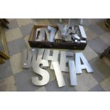 A box of steel letters