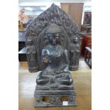 A large oriental bronze seated deity
