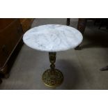 A gilt metal and marble top wine table