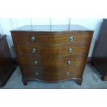 A George III mahogany serpentine chest of drawers