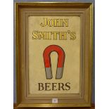 A John Smiths Beers advertising sign