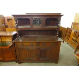 An Arts and Crafts oak dresser