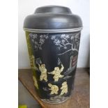 An oriental black chinoiserie ginger jar and cover