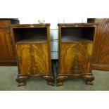 A pair of mahogany serpentine pot cupboards