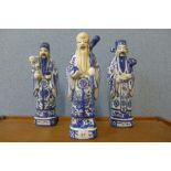 A set of three Chinese blue and white porcelain figures Immortals