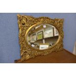 A gilt framed mirror