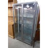 A steel and glass medical cabinet