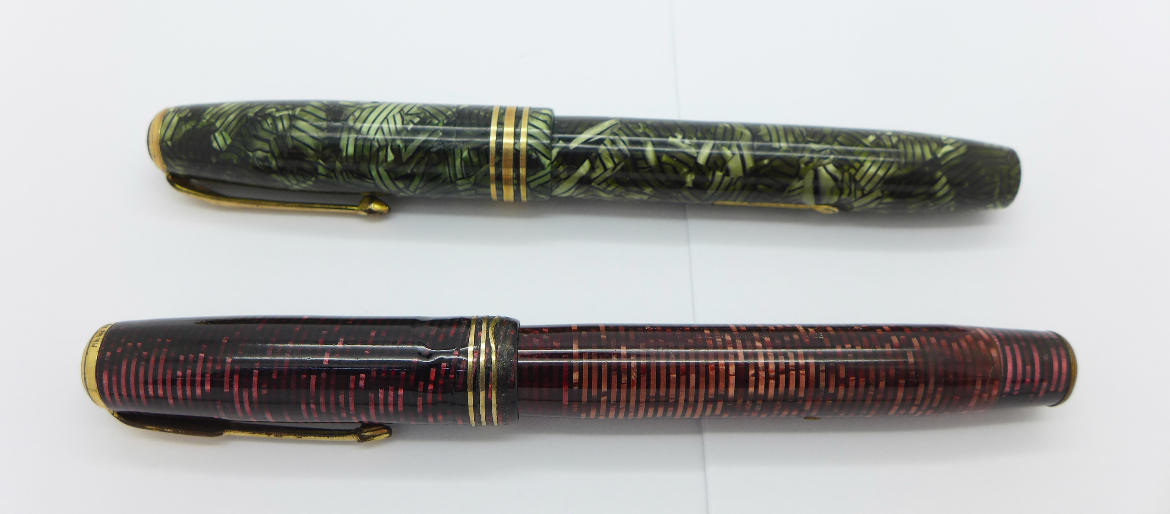 Two fountain pens with 14ct gold nibs,