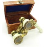 A pair of opera glasses with box