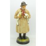 A Royal Doulton figure, Lambing Time, restored,