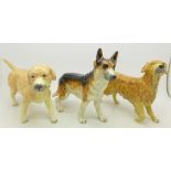 Three Royal Doulton figures of dogs, Labrador,