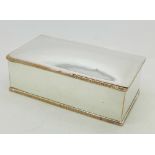 A silver plate on copper cigarette box,