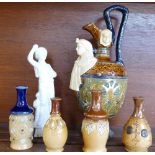 A majolica Egyptian revival ewer, four miniature Doulton stoneware bottles, one a/f,