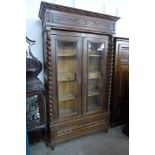 A 19th Century French beech armoire bookcase