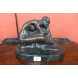 A French style bronze figure of a seated female nude,