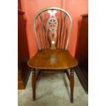 A Victorian elm Windsor kitchen chair