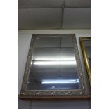 A gilt framed mirror